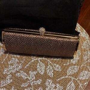Elegant Brown Clutch with Gold Accents